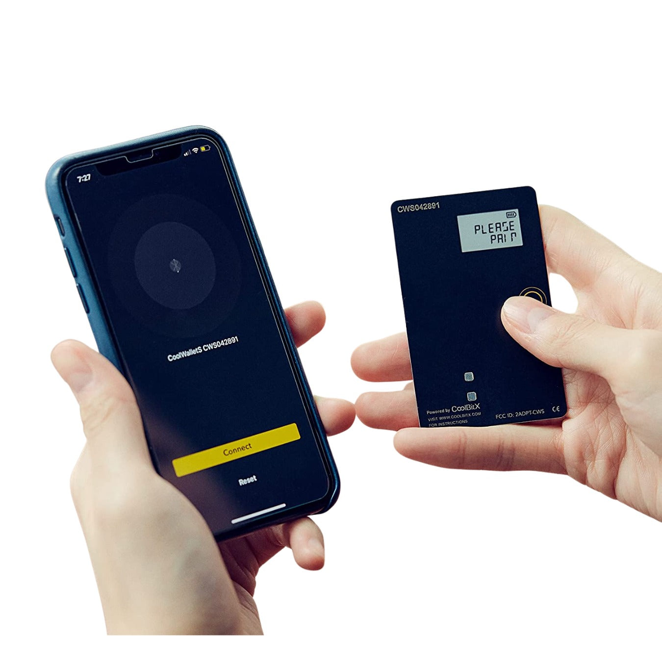 A person's hands: the right holding a CoolWallet S hardware wallet, and the left displaying a crypto wallet on an iPhone.